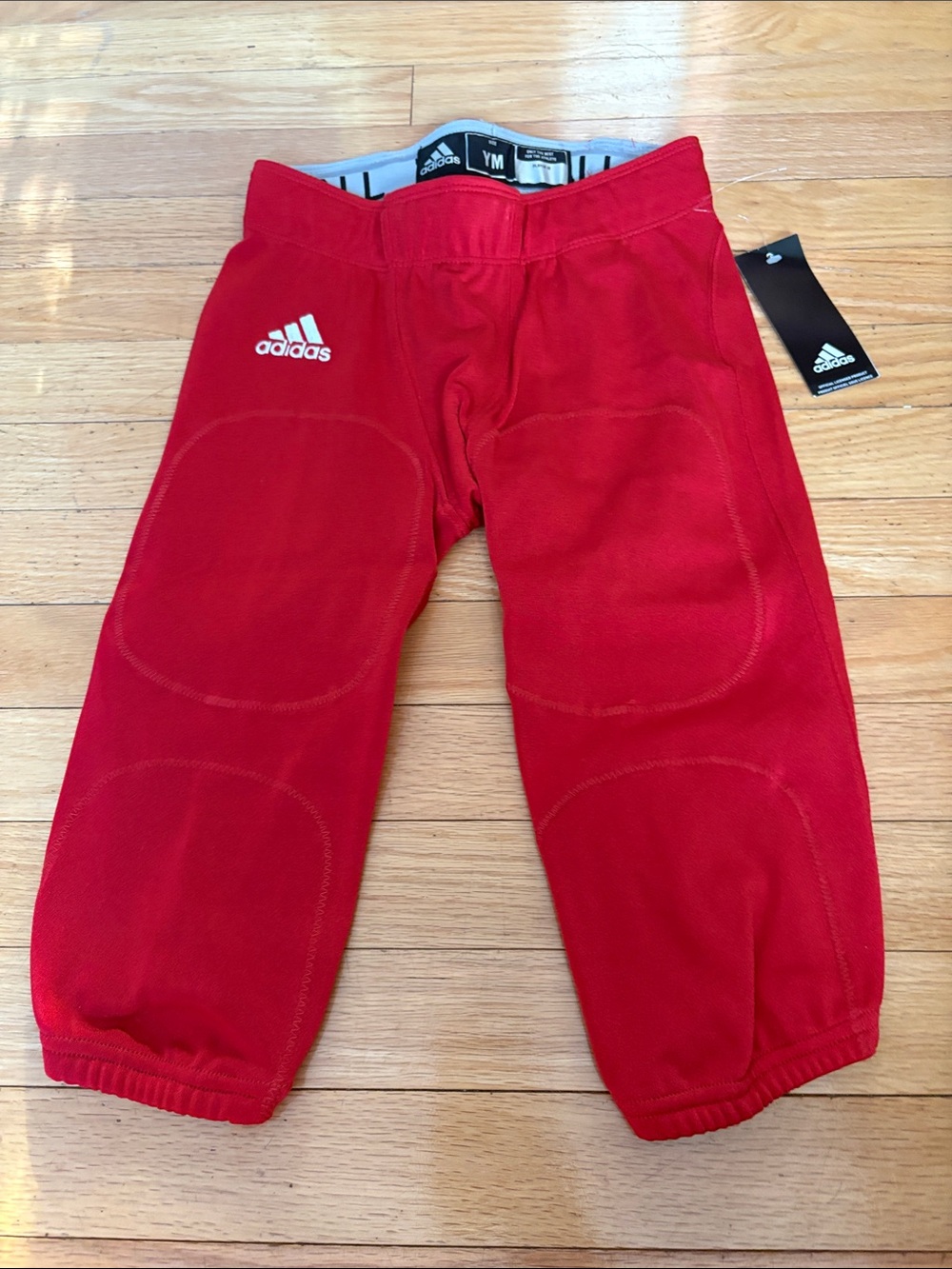 adidas Red Padded Kids Football pants.